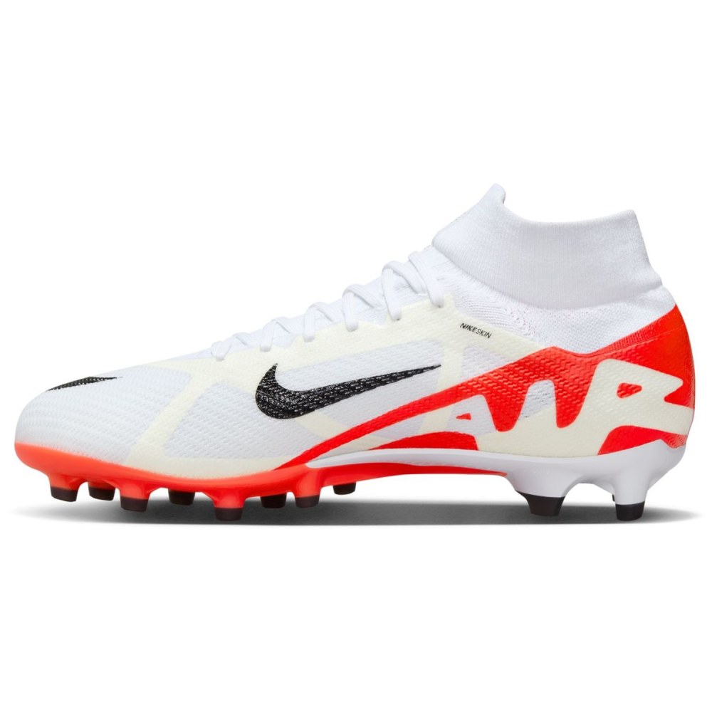 Soccer cleats white and orange top